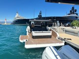 Looking at the aft of the GT40 Alpine with port side balcony deck in lowered position, starboard side deck in up position